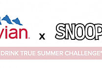 Evian met l'esprit Snoopy en bouteille