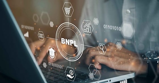 BNPL Buy now pay later online shopping concept. Businessmen using a computer to