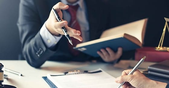 Businessman and lawyer discuss the contract document. Treaty of the law. Sign a contract business.